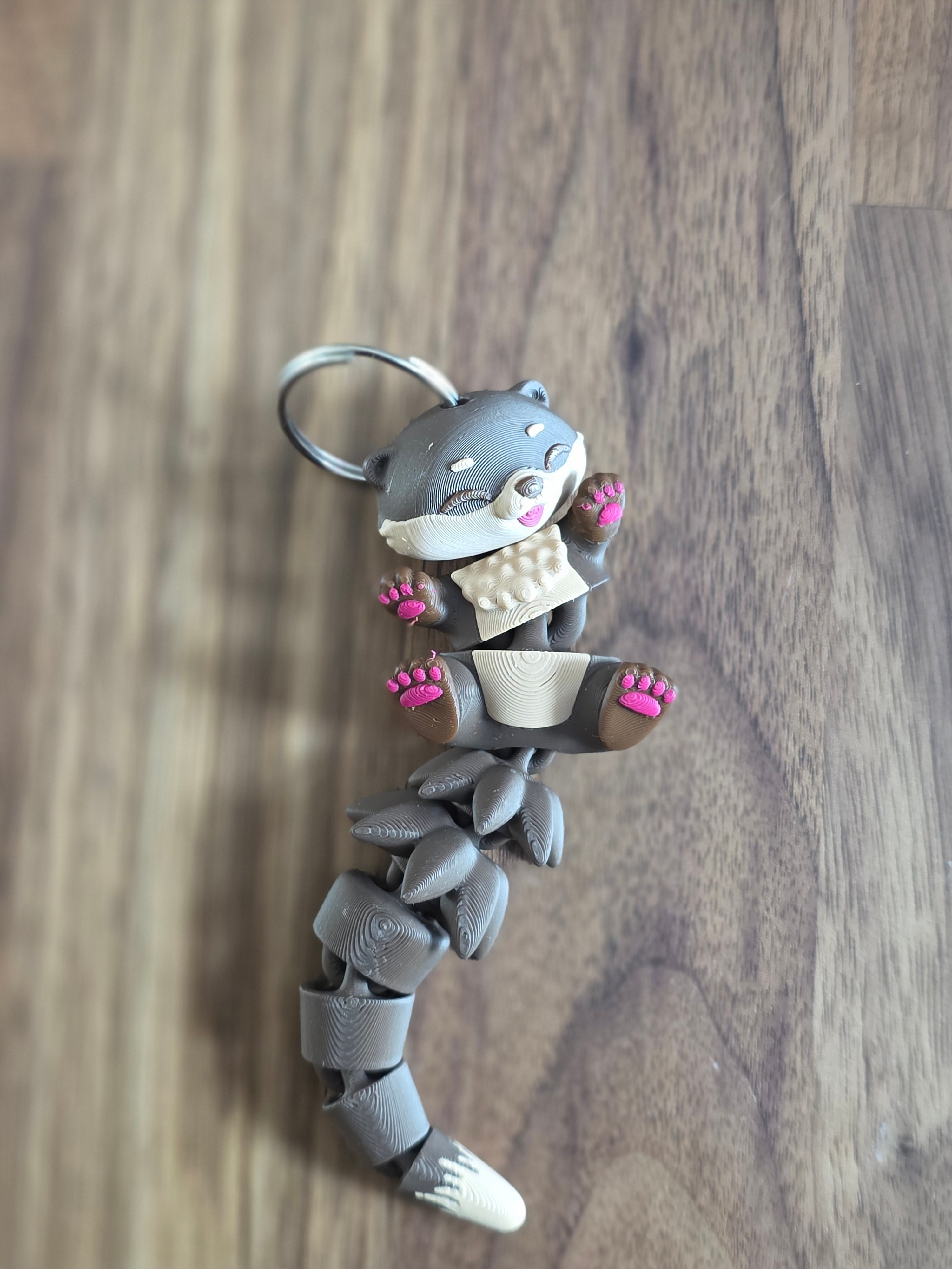 Otter with flexible tail keychain