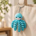 Octopussleutelhanger aan een tas