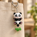 Pandasleutelhanger aan een tas