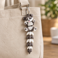 Puppysleutelhanger aan een tas