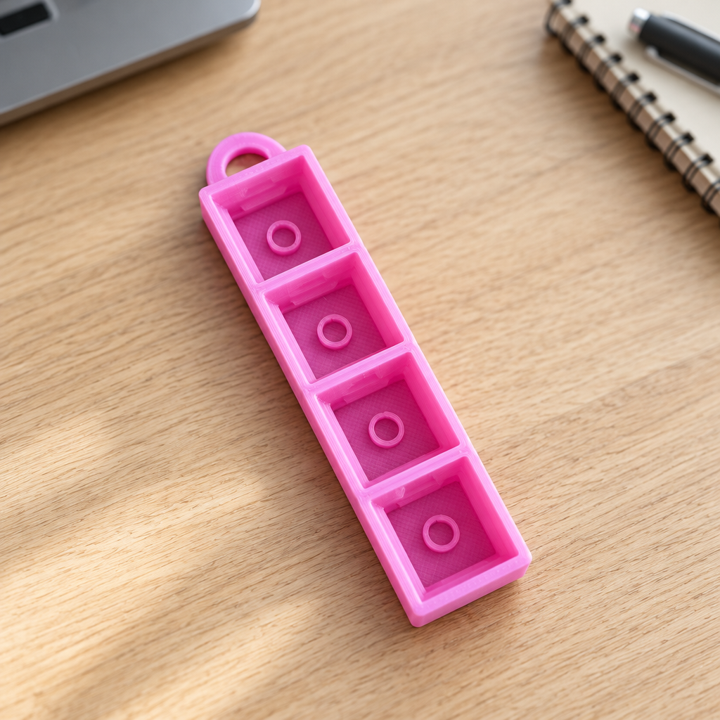 Roze clicker op een bureau